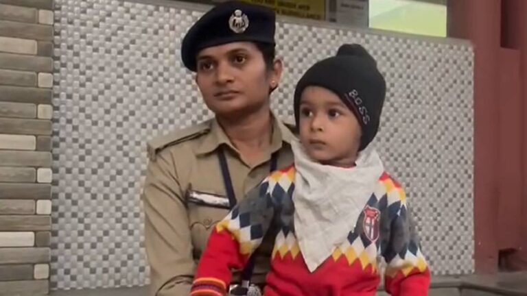 Rajkot's female constable is performing election duty with her two and a half year old daughter.