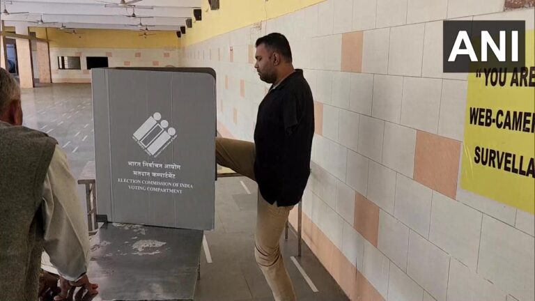 A great example of voting awareness in Nadiad: A disabled youth casts his vote by pressing a button with his foot